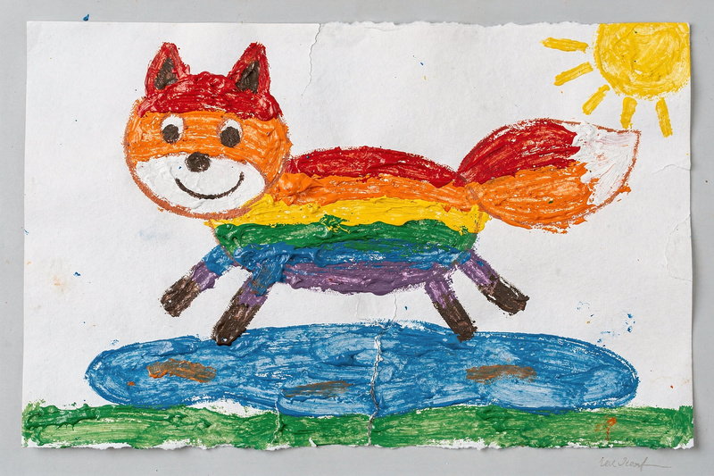 Tempera painting of a smiling fox striped red, orange, yellow, green, blue and purple, leaping over a blue puddle on a strip of green grass, with a yellow sun in the corner.